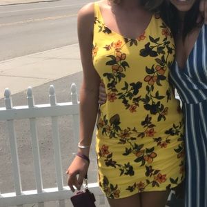 Yellow flower urban outfitter dress. Worn a few times but like new! Gorgeous
